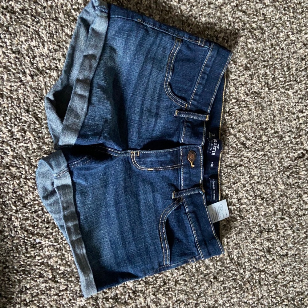 Hollister dark wash midi shorts.